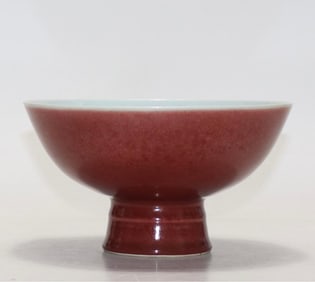 A red glazed high bowl made in the Qianlong period of the Qing Dynasty