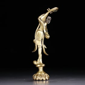 A Tang-style copper-gilt lady ornament