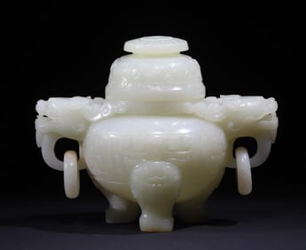 A white jade carved animal face pattern amphora from the Qing Dynasty