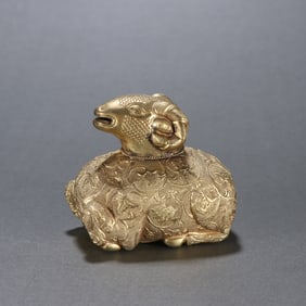 A Qing copper gilt sheep carving