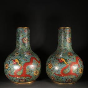 A pair of Qing copper tire painting enamel dragon pattern celestial ball vases