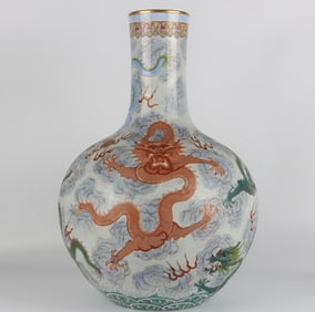A Qing Qianlong pastel auspicious cloud dragon pattern celestial ball vase