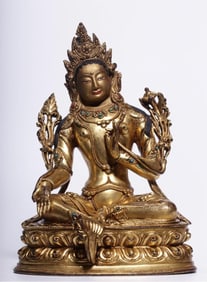 A seated statue of Tara, a bronze gilt green Tara, from the Qing Dynasty