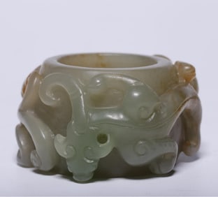 A piece of pre-Ming Hetian jade with emerald dragon pattern fingers