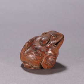 A Qing Dynasty bamboo carved golden toad