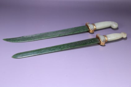 A set of Qing Dynasty Hetian white jade-handled jasper body swords