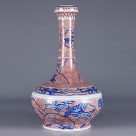 A blue and white glaze red sea water auspicious beast pattern garlic water chestnut bottle