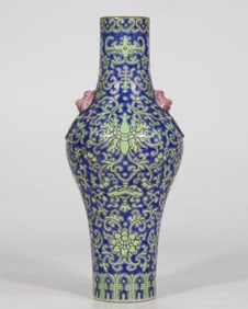 A blue-background green entwined flower amphora olive vase made in the Qianlong period of the Qing