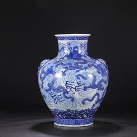 A Qing Dynasty Qianlong blue and white seawater cloud dragon pattern animal ear bottle