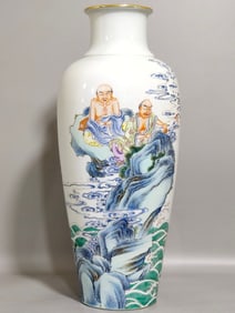 A Qing Yongzheng pastel dragon descending Arhat vase