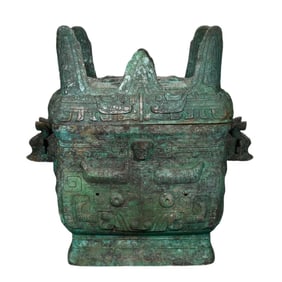A bronze beast-faced square jar