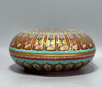 A golden pastel lotus petal fruit box made in the Qianlong period of the Qing Dynasty