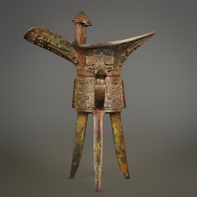 A bronze beast-faced dragon cup of the Western Zhou Dynasty