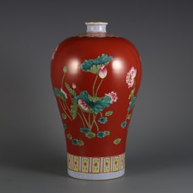 A plum vase made in the Yongzheng era of the Qing Dynasty with a coral red background and pastel