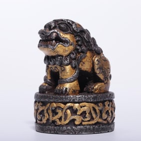 A Qing Dynasty iron-cut gold-entwined lion seal
