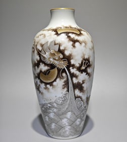 A Qianlong year ink color sea water dragon godson gold-painted plum vase