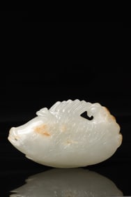 A Qing Dynasty Hetian jade carving salmon ornament
