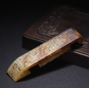 An ancient jade sword ornament