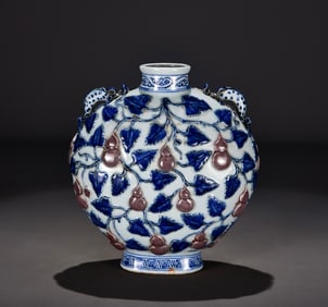 A Yuan blue and white glazed red carved Fulutu flat vase