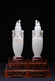 A pair of Hetian jade dragon ear cap bottles