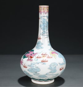 A long-necked vase with a pastel cloud dragon pattern painted gold made in the Qianlong period of