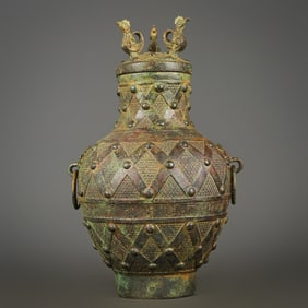 A bronze milk Ding standing bird bottle from the Western Zhou Dynasty