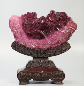 A Qing Dynasty tourmaline fish dragon immortal interpolation
