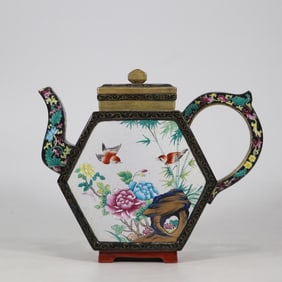 A Qing Qianlong year flower and bird six-square pot