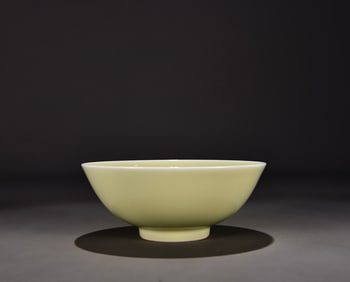 A Qing Yongzheng tender yellow glazed bowl