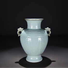 A Qing Qianlong celadon carved banana pattern gold-painted amphora