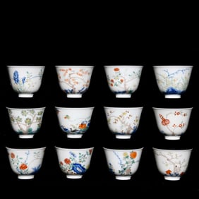 A set of Qing Kangxi blue and white colorful twelve flower god cups