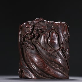 A Qing Dynasty small-leaved rosewood evergreen pen holder for all seasons