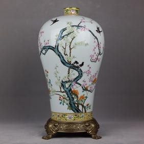 A pastel flower and bird inlaid plum vase with a copper bottom