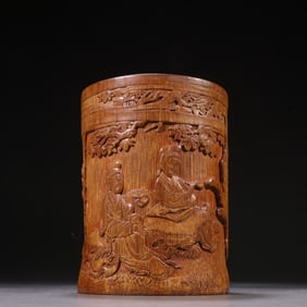 A bamboo carved maid pen holder of the Qing Dynasty