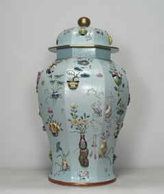 A piece of Qing Qianlong pastel green ground rolled road pattern carved Bogu Bafang general jar