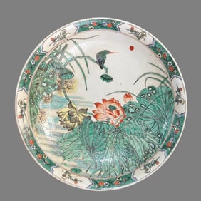 A Qing Kangxi colorful flower and bird lotus plate