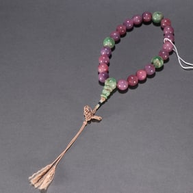 A piece of Qing Dynasty ruby eighteen sons held