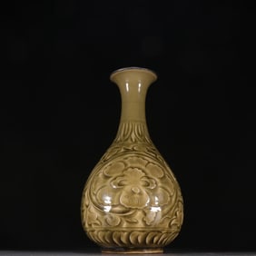 A Song Dynasty Yaozhou kiln entwined flower long-necked bottle