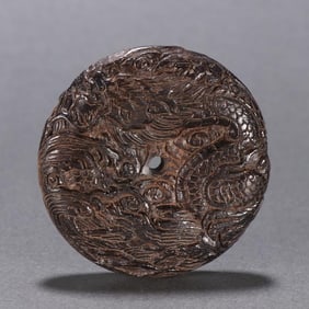 A Qing Dynasty agarwood cloud dragon pattern card