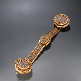 A Qing Dynasty gilt filigree baked blue "Fushou" ruyi handle