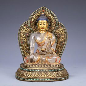 An eighteenth-century Tibetan old crystal with bronze gilt statue of the Medicine Buddha