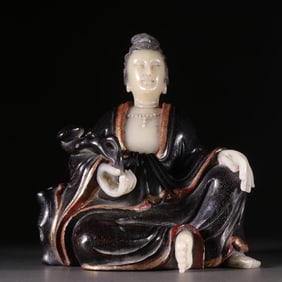 A Qing Dynasty rosewood inlaid Shoushan stone Guanyin ornament