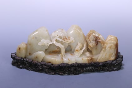 A Qing Dynasty Hetian jade character story mountain ornament