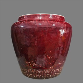 A large pot with a red glaze dark engraved dragon pattern in the Ming Dynasty