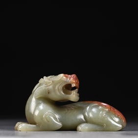 A Qing Dynasty Hetian jade beast ornament