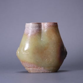 A double-hole vessel with a plain pattern of ancient jade