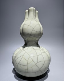 A Qing Qianlong style Ge glazed triptych gourd bottle