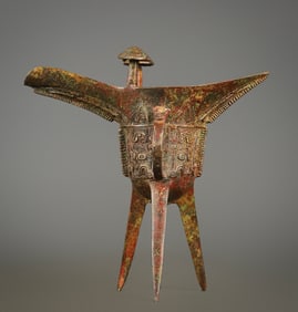 A bronze beast-faced cup of the Western Zhou Dynasty