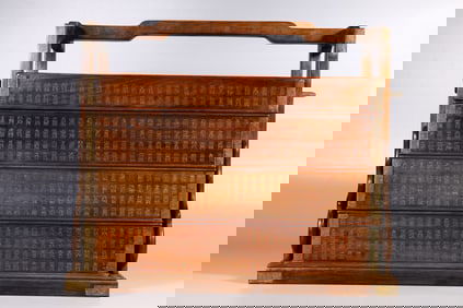 A Qing Dynasty Huanghuali longevity pattern lifting beam box