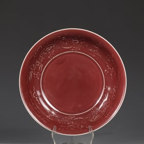 A Ming Yongle Ji red glazed dragon pattern plate
